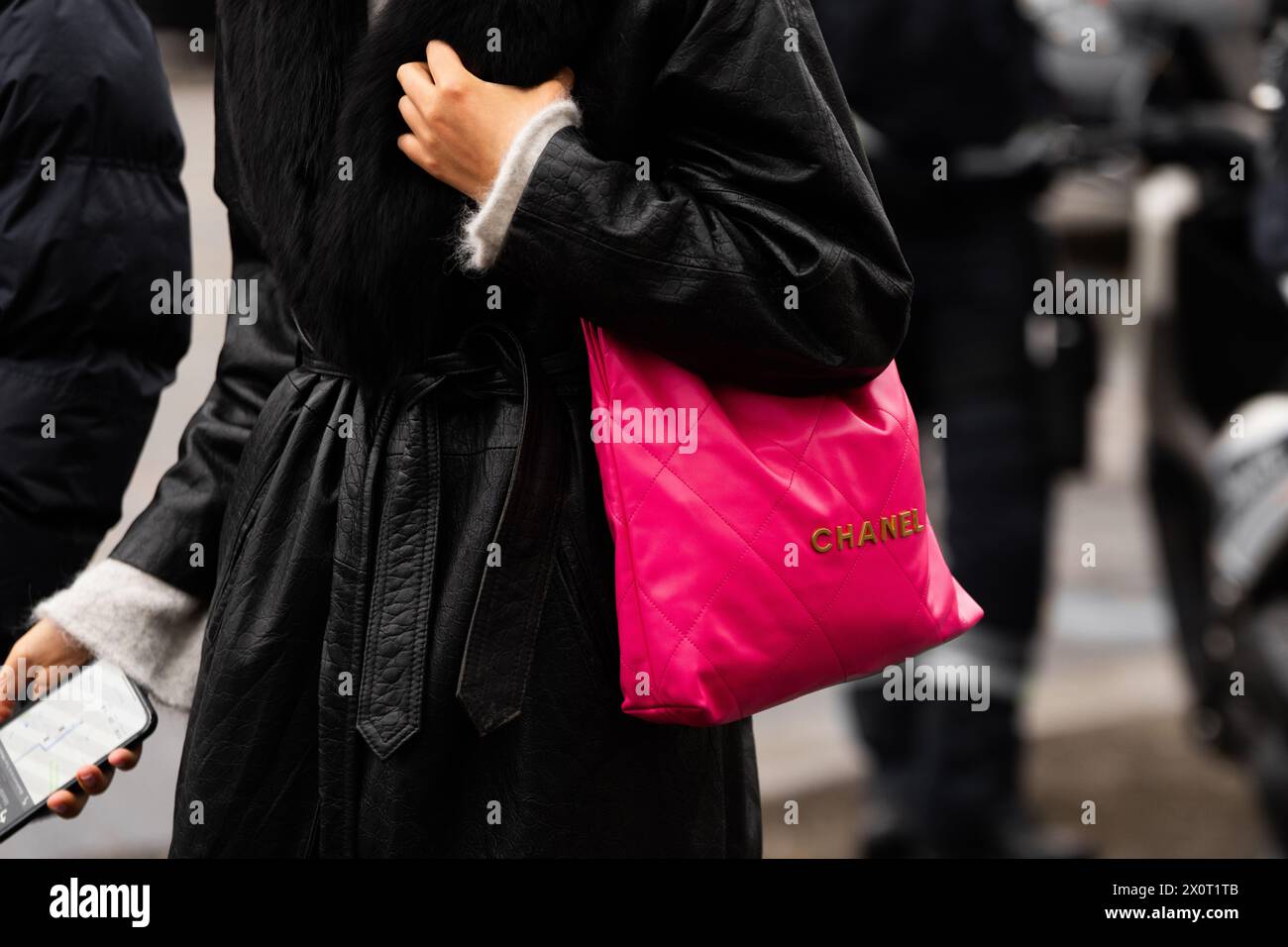 Paris, France - January, 24, 2024: woman wears Chanel bag, street style details, fashion detail. Stock Photo
