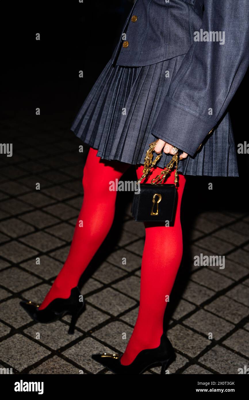 Paris, France February, 29, 2024 woman wears Schiaparelli leather