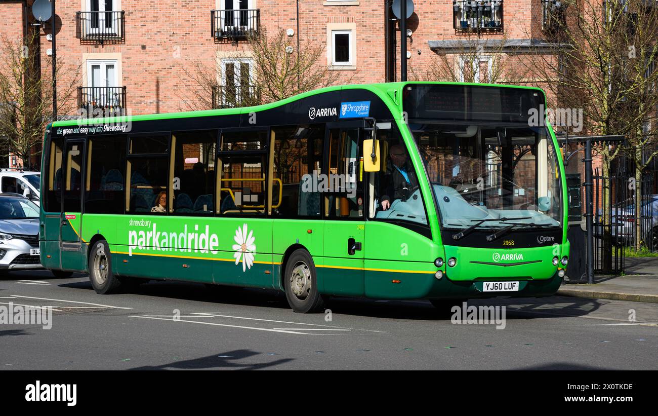 Shrewsbury, UK - March 19, 2024; Arriva passenger bus in green Shrewsbury Park and Ride paint scheme Stock Photo