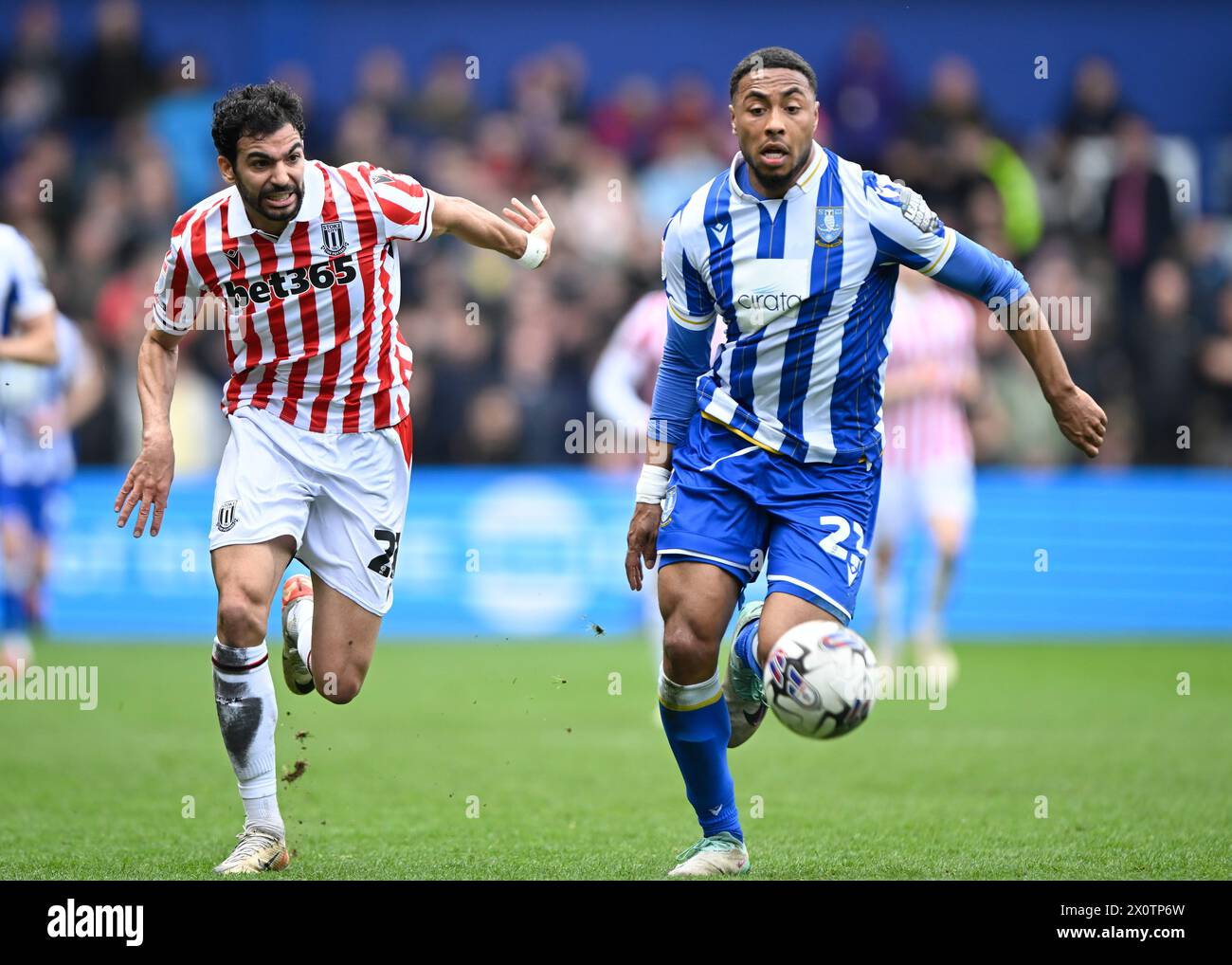 Jeff Hendrick of Sheffield Wednesday is chased back by, Mehdi Lérisduring the Sky Bet Championship match Sheffield Wednesday vs Stoke City at Hillsborough, Sheffield, United Kingdom, 13th April 2024 (Photo by Craig Cresswell/News Images) in, on 4/13/2024. (Photo by Craig Cresswell/News Images/Sipa USA) Credit: Sipa USA/Alamy Live News Stock Photo