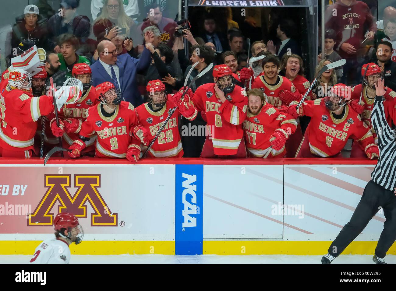 Minneapolis, Minnesota, USA. 13th Apr, 2024. The Denver bench celebrates after the 2024 NCAA D1