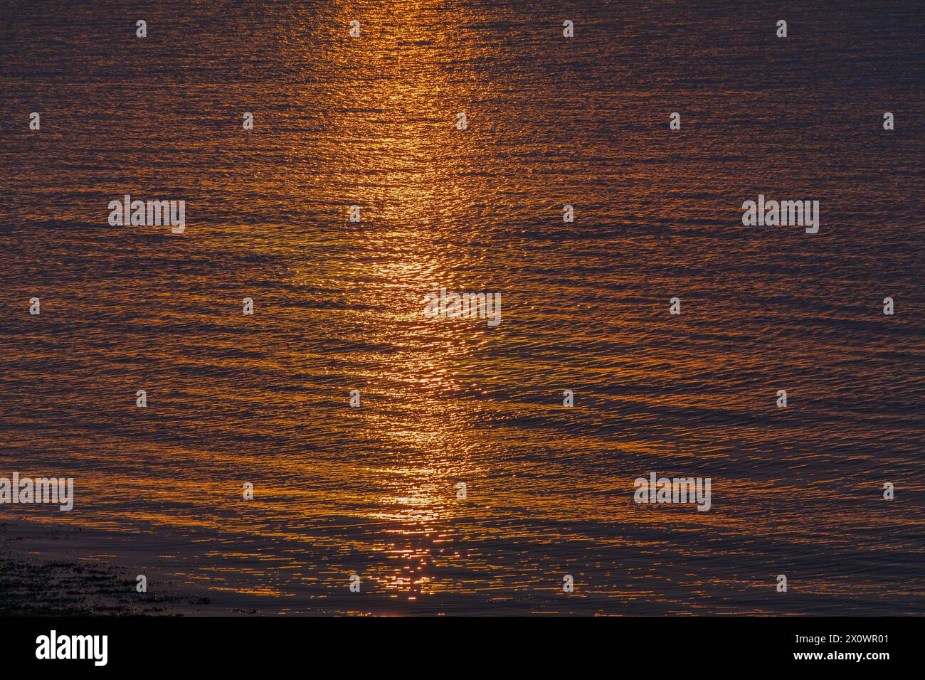 Sunlight reflecting onto the sea Stock Photo