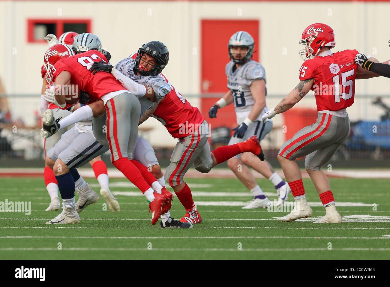 AMSTERDAM, NETHERLANDS - APRIL 13: Younes Kwyasse of Amsterdam Crusaders, seam Hon of Amsterdam Crusaders during the friendly American football match Stock Photo