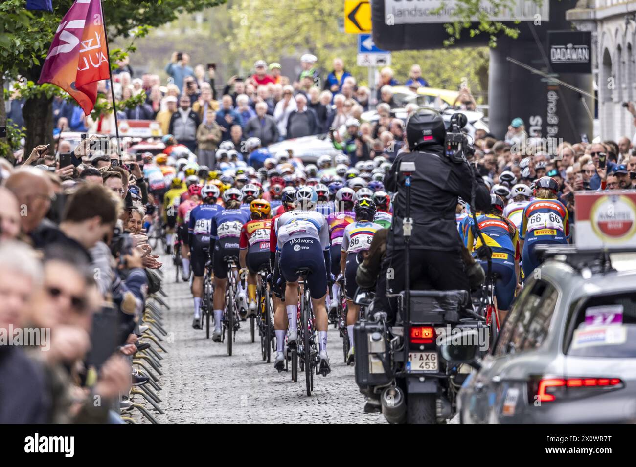 MAASTRICHT - The ladies just after the start of the Amstel Gold Race 2024 on April 14, 2024 in Maastricht, the Netherlands. This one-day cycling race is part of the UCI WorldTour. ANP MARCEL VAN HOORN Stock Photo