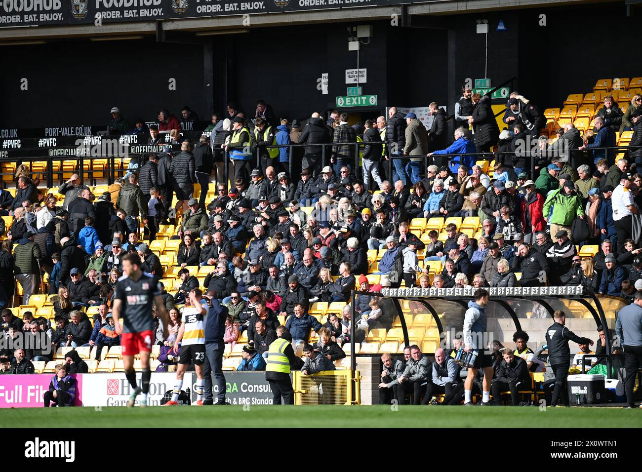 Burslem, UK, 13th April 2024. A mass exodus of Port Vale fans after the visitors take a 2-4 lead during the EFL League One fixture, which leaves Vale further adrift in the relegation zone. Port Vale took a 2-0 lead into the half time break. Credit: TeeGeePix/Alamy Live News Stock Photo