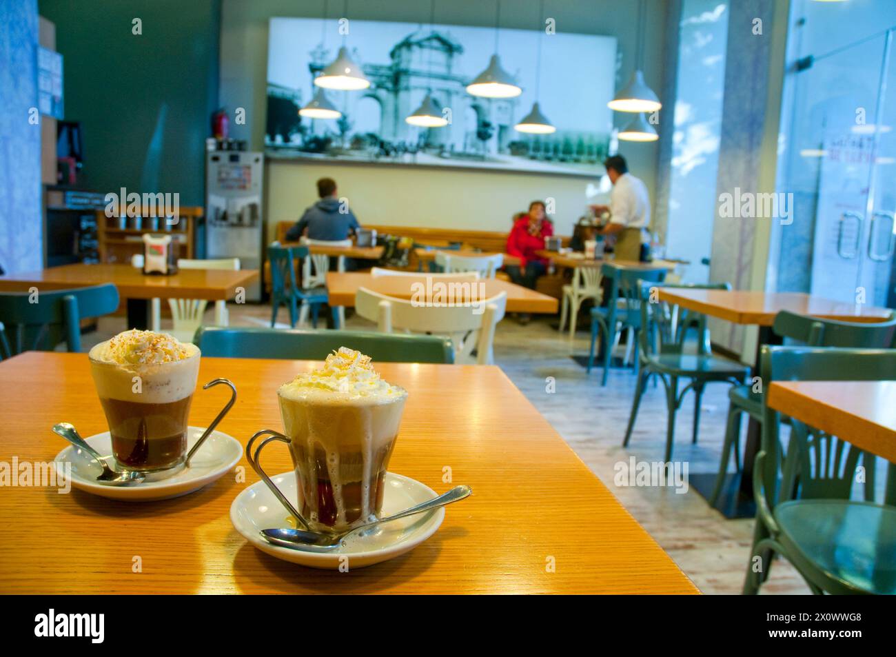 Two glasses of Irish coffee in a modern cafe. Madrid, Spain. Stock Photo