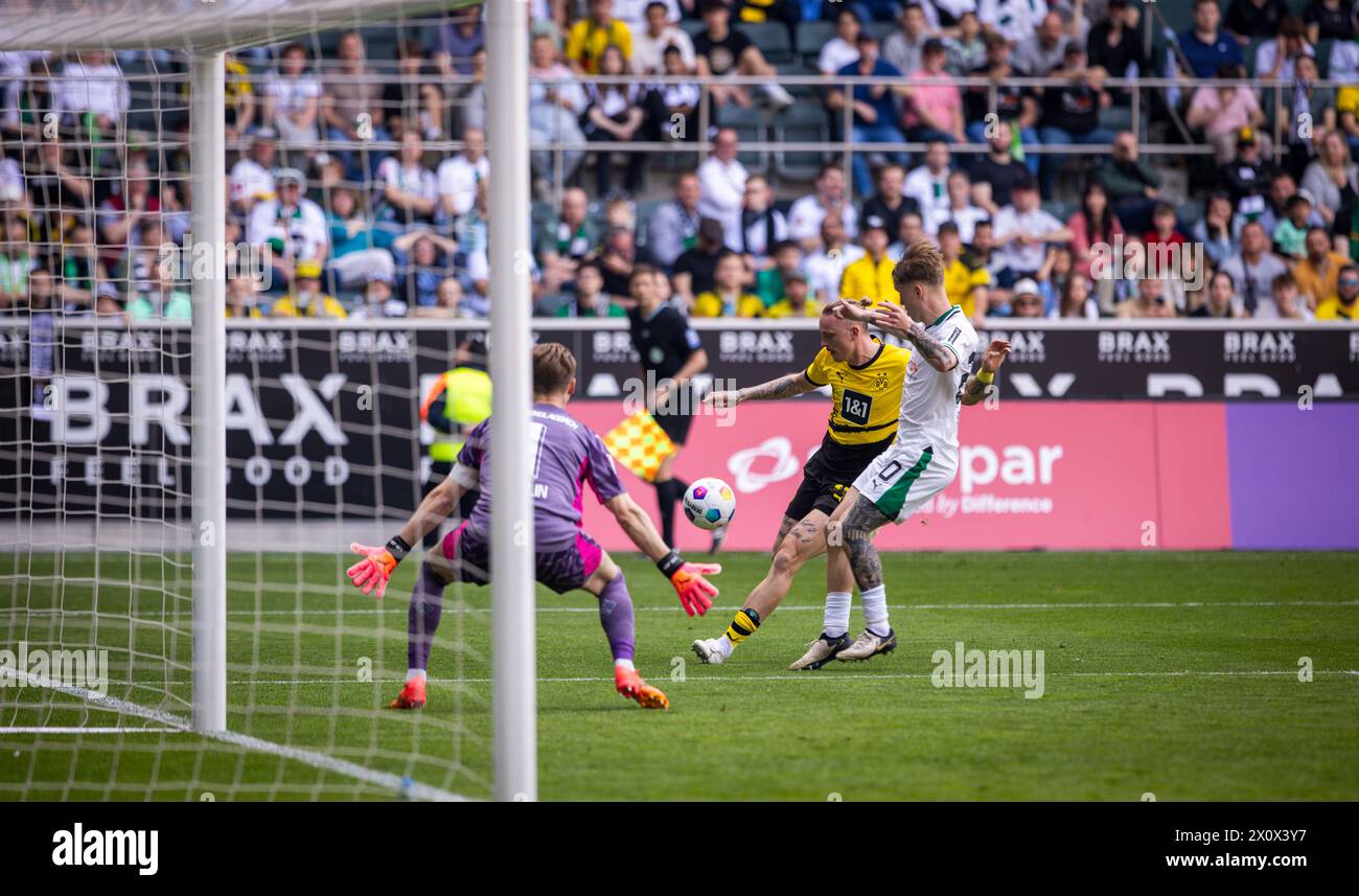 Mönchengladbach Germany. 13th Apr 2024. Marius Wolf (BVB) Luca Netz