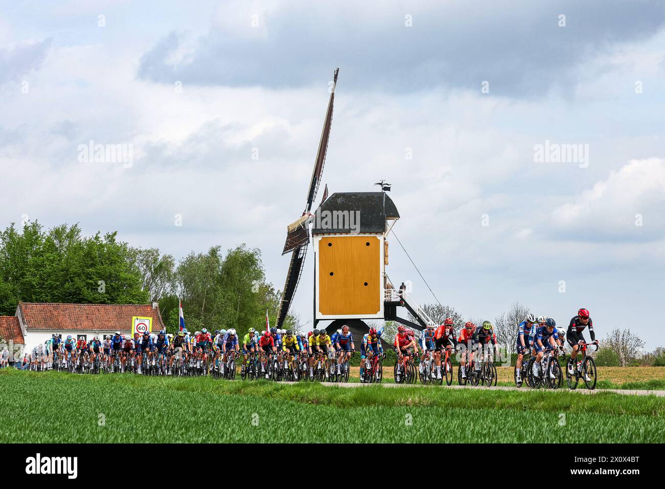 BEEK - Participants in action during the Amstel Gold Race 2024 on April 14, 2024 in Beek, the Netherlands. This one-day cycling race is part of the UCI WorldTour. ANP VINCENT JANNINK Stock Photo