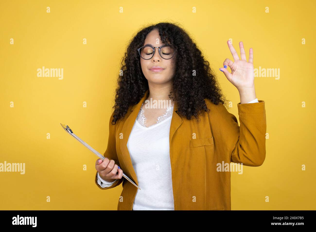 Woman eyes up finger hi-res stock photography and images - Alamy