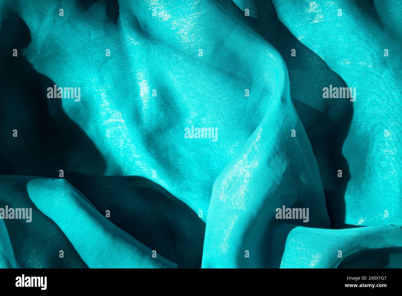 Luminous depths - shimmering aqua fabric patterns Stock Photo - Alamy