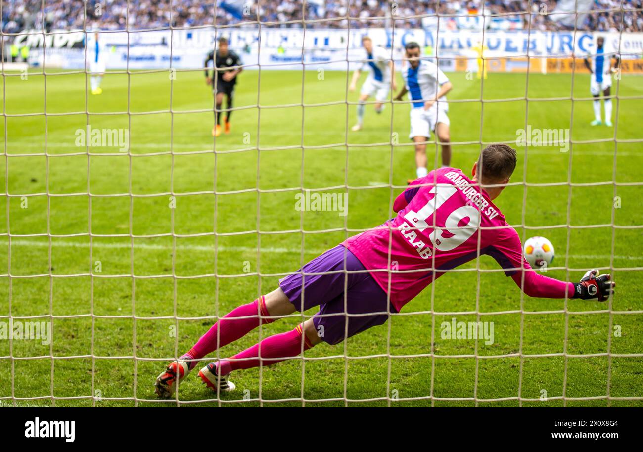 Magdeburg, Germany. 14th Apr, 2024. Soccer: Bundesliga 2, 1. FC Magdeburg - Hamburger SV, Matchday 29, MDCC-Arena. Mohammed El Hankouri of 1. FC Magdeburg converts a penalty kick to make it 1:0 against Hamburg goalkeeper Matheo Raab (r). Credit: Andreas Gora/dpa - IMPORTANT NOTE: In accordance with the regulations of the DFL German Football League and the DFB German Football Association, it is prohibited to utilize or have utilized photographs taken in the stadium and/or of the match in the form of sequential images and/or video-like photo series./dpa/Alamy Live News Stock Photo