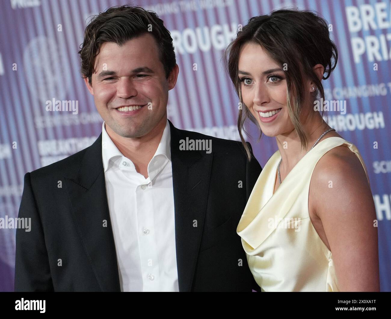 (LR) Magnus Carlsen and Lori Anne Hackel at the 10th Annual