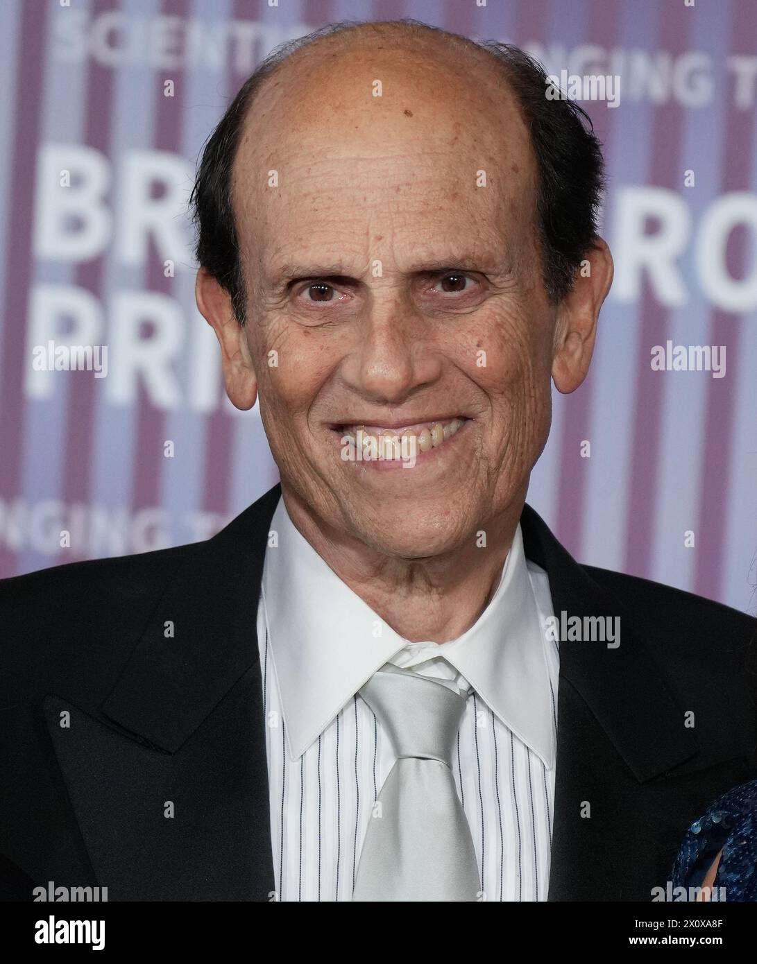 Michael Milken arrives at the 10th Annual Breakthrough Prize Ceremony