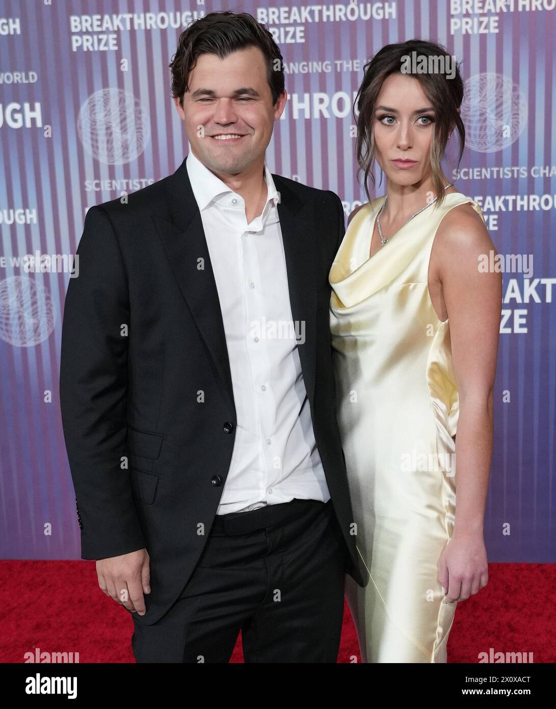 (LR) Magnus Carlsen and Lori Anne Hackel at the 10th Annual