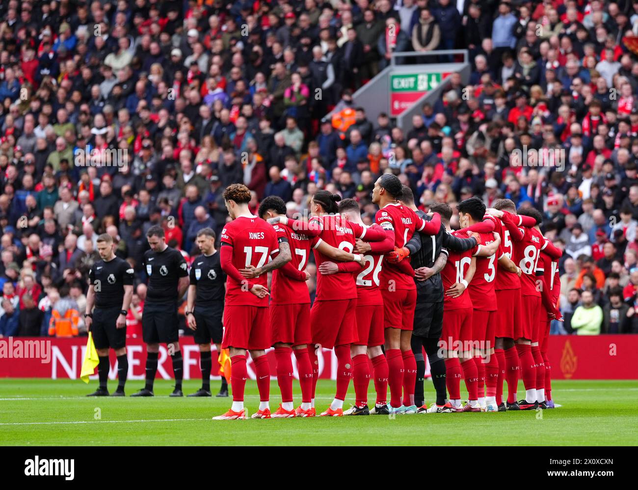 Liverpool players observe a minute's silence for the victims of the Hillsborough disaster ahead of the Premier League match at Anfield, Liverpool. Picture date: Sunday April 14, 2024. Stock Photo