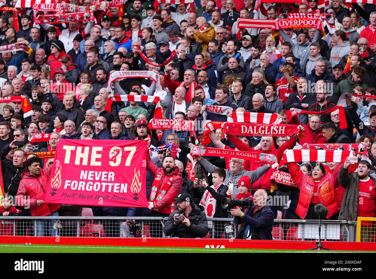 Liverpool fans in the stands show their support ahead of the Premier League match at Anfield, Liverpool. Picture date: Sunday April 14, 2024. Stock Photo