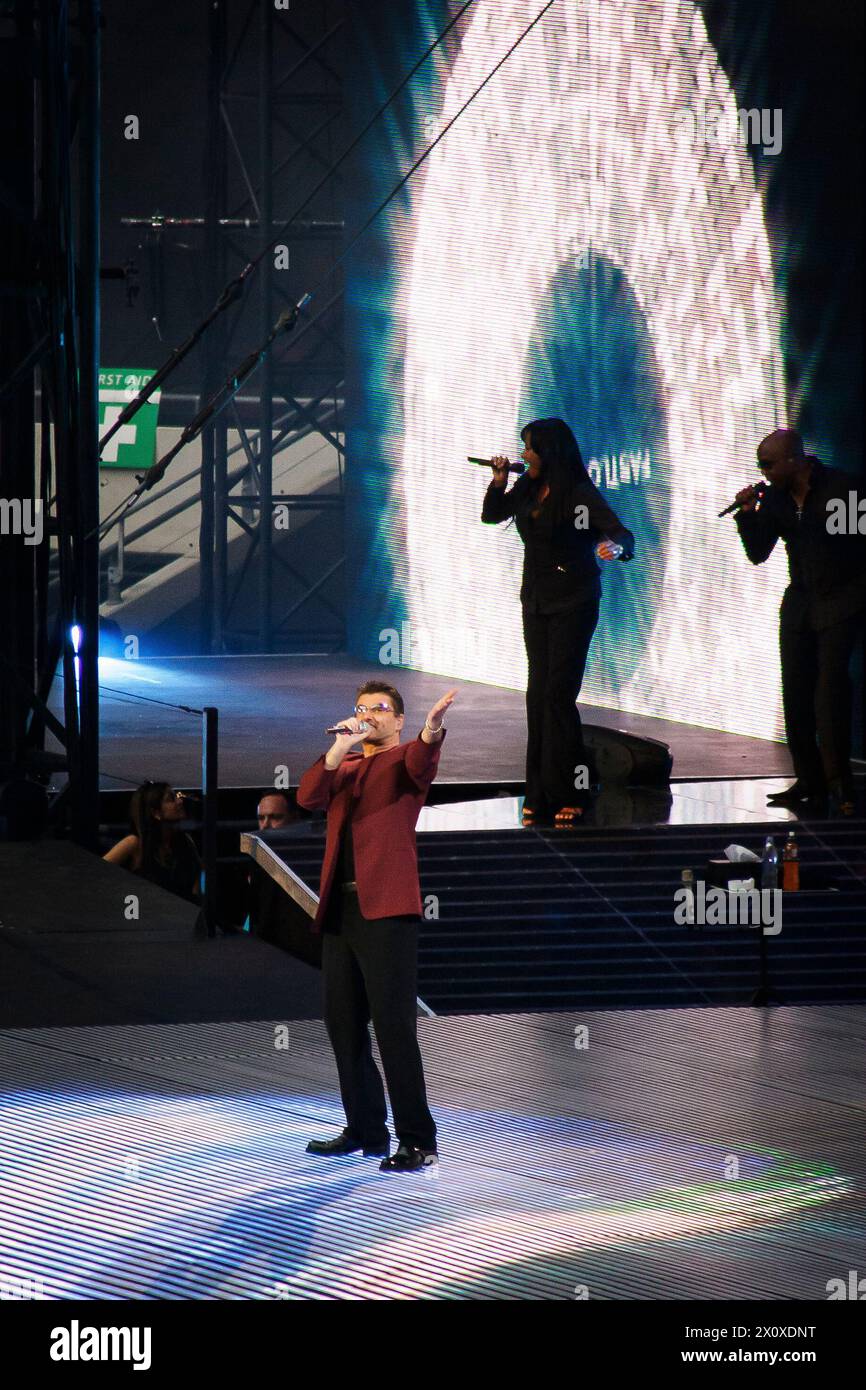 George Michael performing in concert at the opening night of the new Wembley Stadium London, England Stock Photo