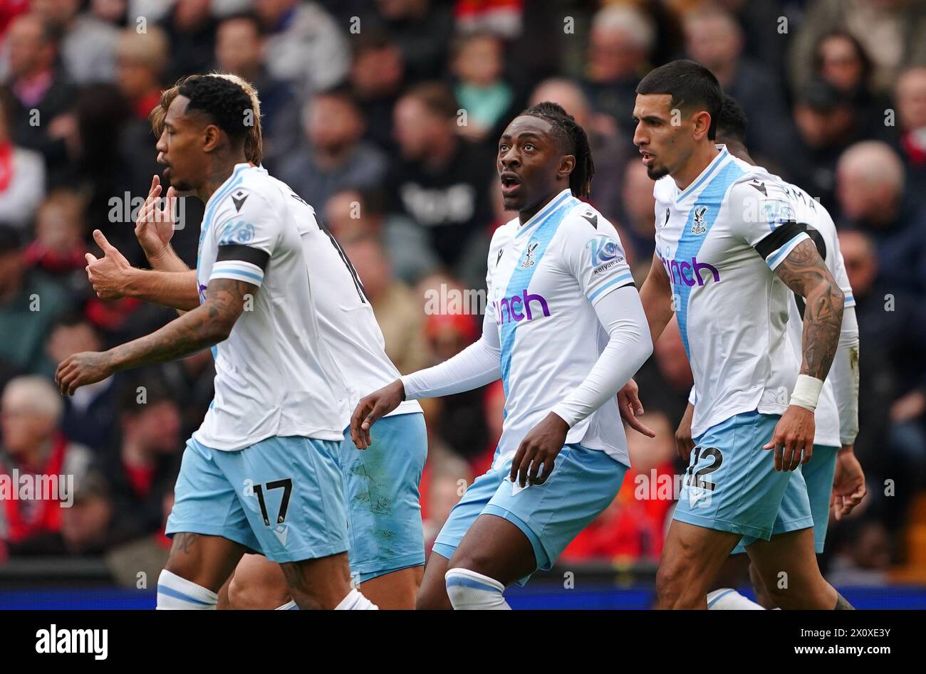 Crystal Palace's Eberechi Eze (centre) celebrates scoring their side's first goal of the game during the Premier League match at Anfield, Liverpool. Picture date: Sunday April 14, 2024. Stock Photo