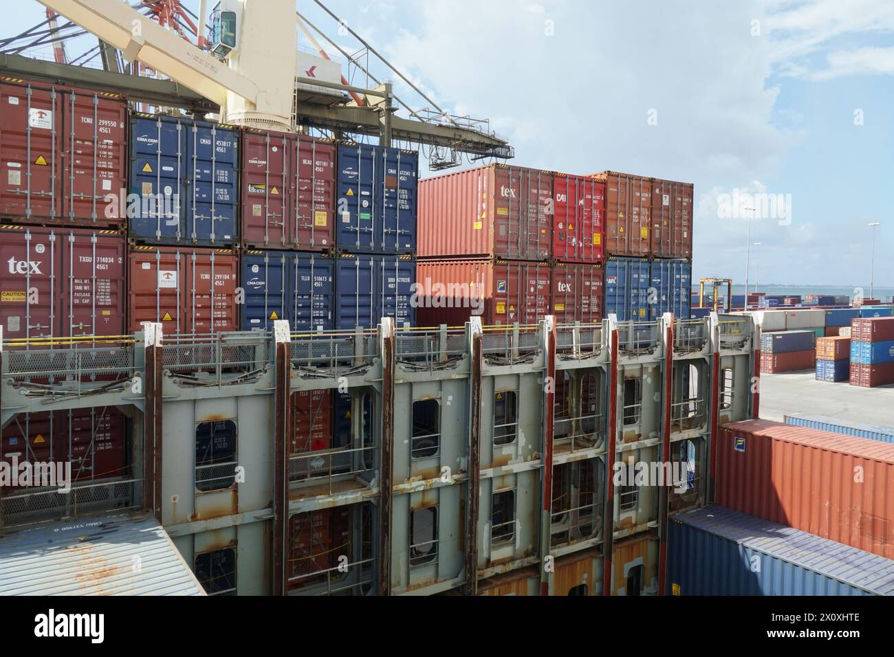 Cell guides and lashing bridges of container vessel with cranes ready ...