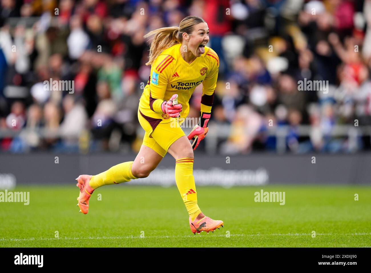 Manchester United goalkeeper Mary Earps celebrates after Rachel Williams (not pictured) scores their side's second goal of the game during the Adobe Women's FA Cup semi-final match at Leigh Sports Village. Picture date: Sunday April 14, 2024. Stock Photo