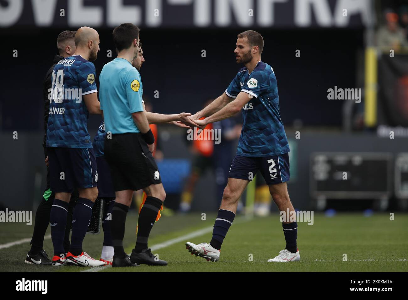 SITTARD - (l-r) Gernot Trauner of Feyenoord, Bart Nieuwkoop of Feyenoord during the Dutch Eredivisie match between Fortuna Sittard and Feyenoord Rotterdam at the Fortuna Sittard Stadium on April 14, 2024 in Sittard, Netherlands. ANP BART STOUTJESDIJK Stock Photo