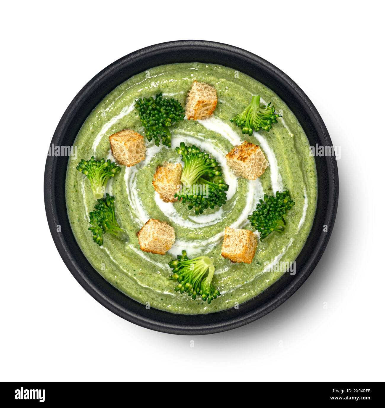 Broccoli cream soup with croutons isolated on white background, top view Stock Photo