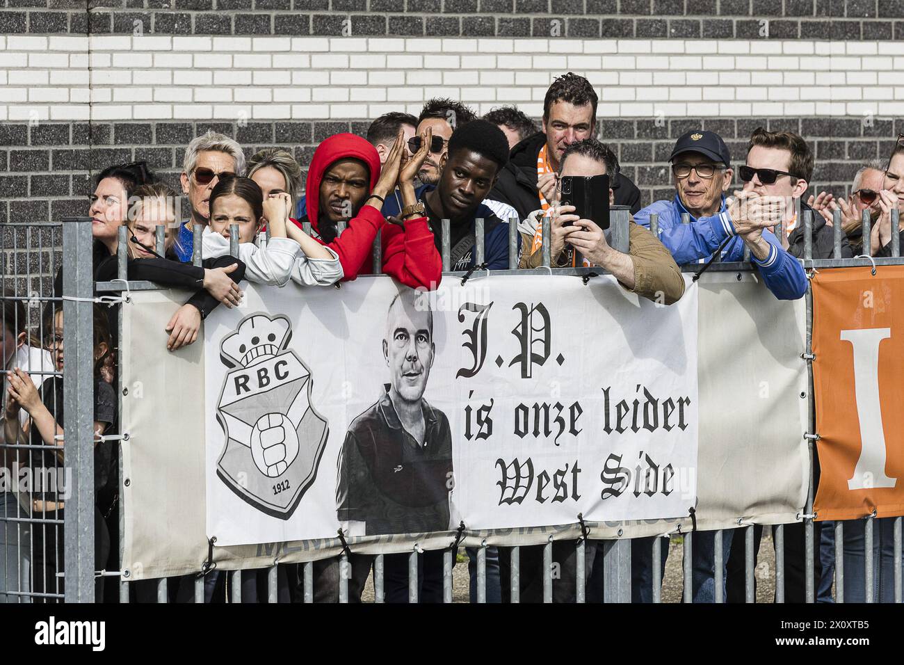 ROOSENDAAL - 14-04-2024. Atik stadium. Voetbal, season 2023-2024. RBC - SV TOP. RBC becomes champion and reaches 4th Division. Fans watching the tribute. Stock Photo