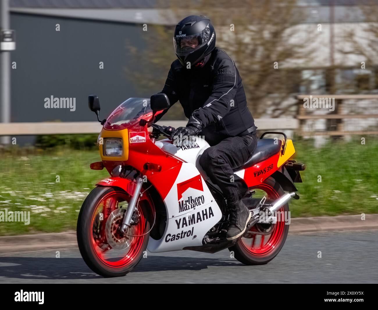 Milton Keynes,UK- Apr 14th 2024: 1986 Yamaha RD 350 ypvs classic motorcycle in Marlboro colours travelling on a British road Stock Photo