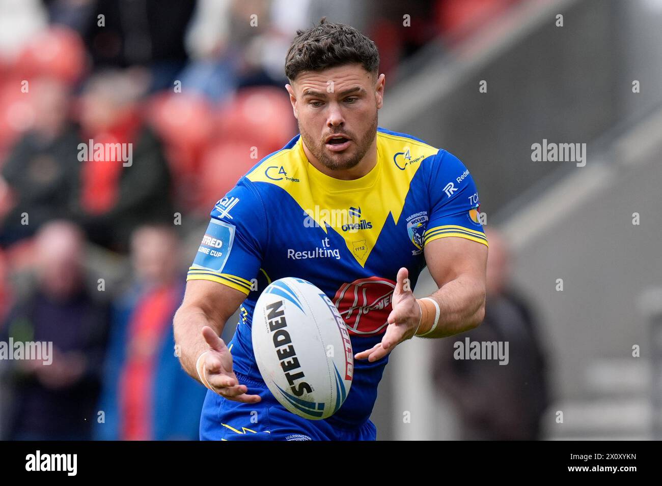 Joe Philbin of Warrington Wolves warms up before the Betfred Challenge ...