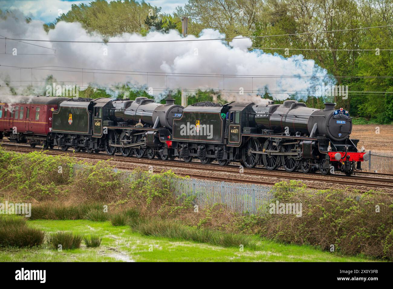 Stanier Black 5 steam locomotives 44871 ( front ) and The Lancashire Fusilier hauling the Great Britain 2024 railtour from Cheltenham to Lancaster Stock Photo