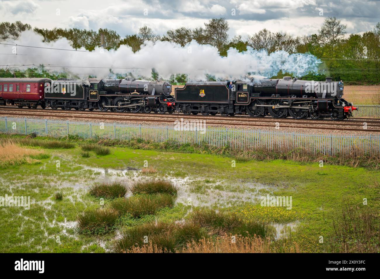 Stanier Black 5 steam locomotives 44871 ( front ) and The Lancashire Fusilier hauling the Great Britain 2024 railtour from Cheltenham to Lancaster Stock Photo