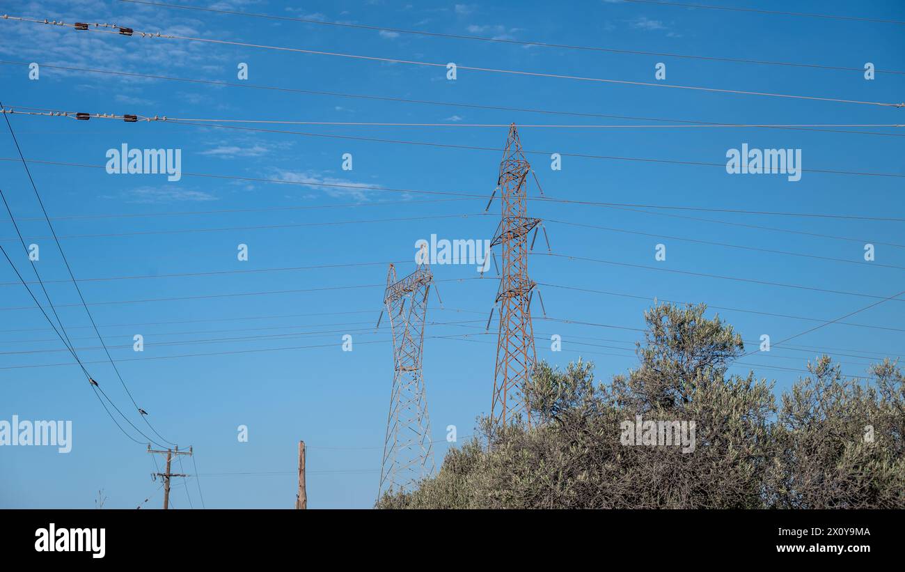 Towers with high voltage wires Stock Photo - Alamy