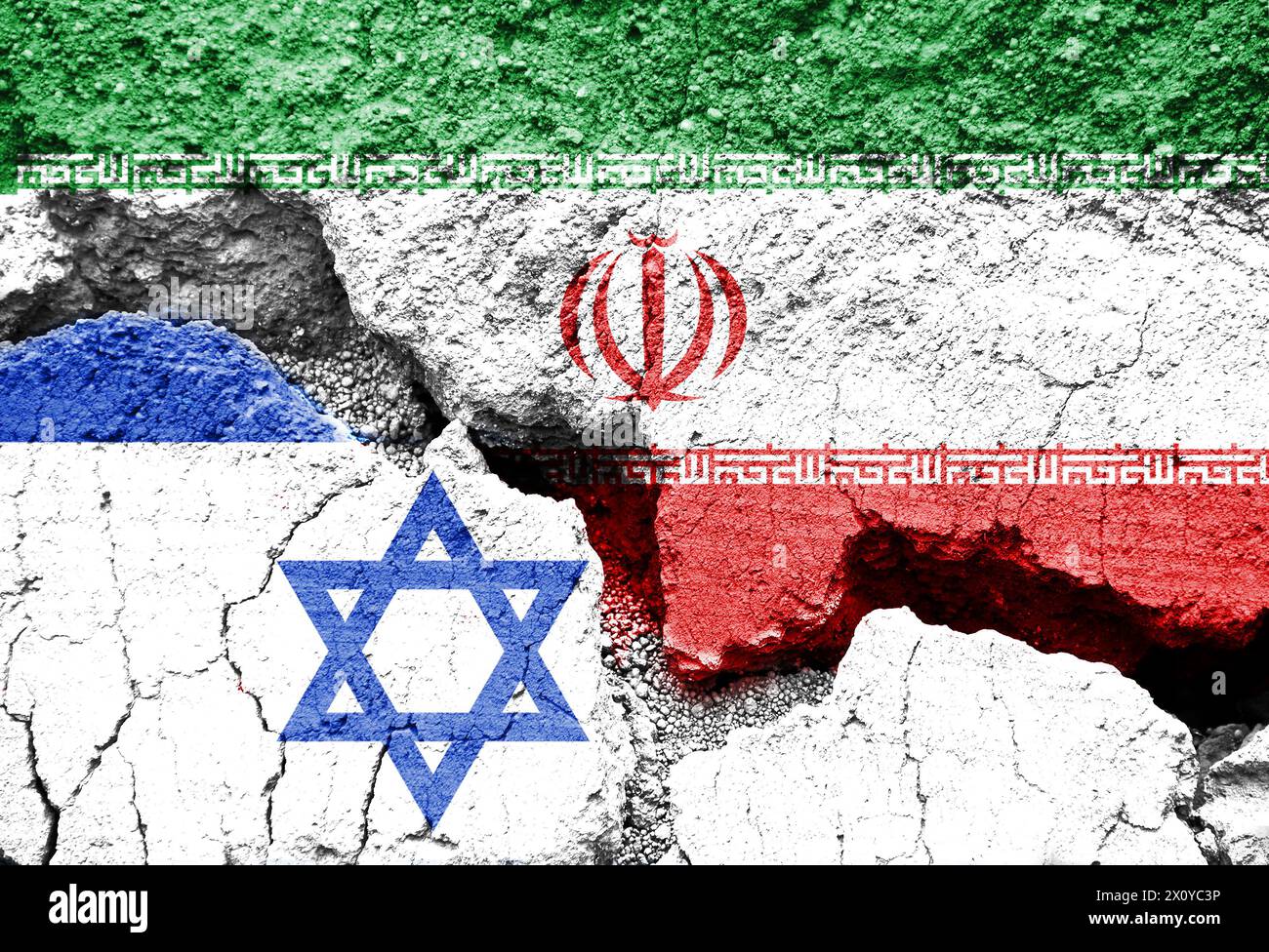 Flags of Israel and Iran on cracked background, Israeli Iranian conflict or war symbol Stock Photo
