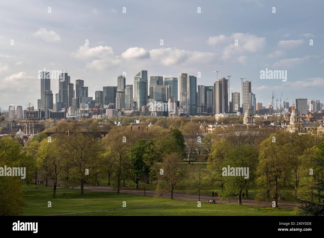 The financial and business district of Canary Wharf  in London, UK, seen from Greenwich Park across the River Thames Stock Photo
