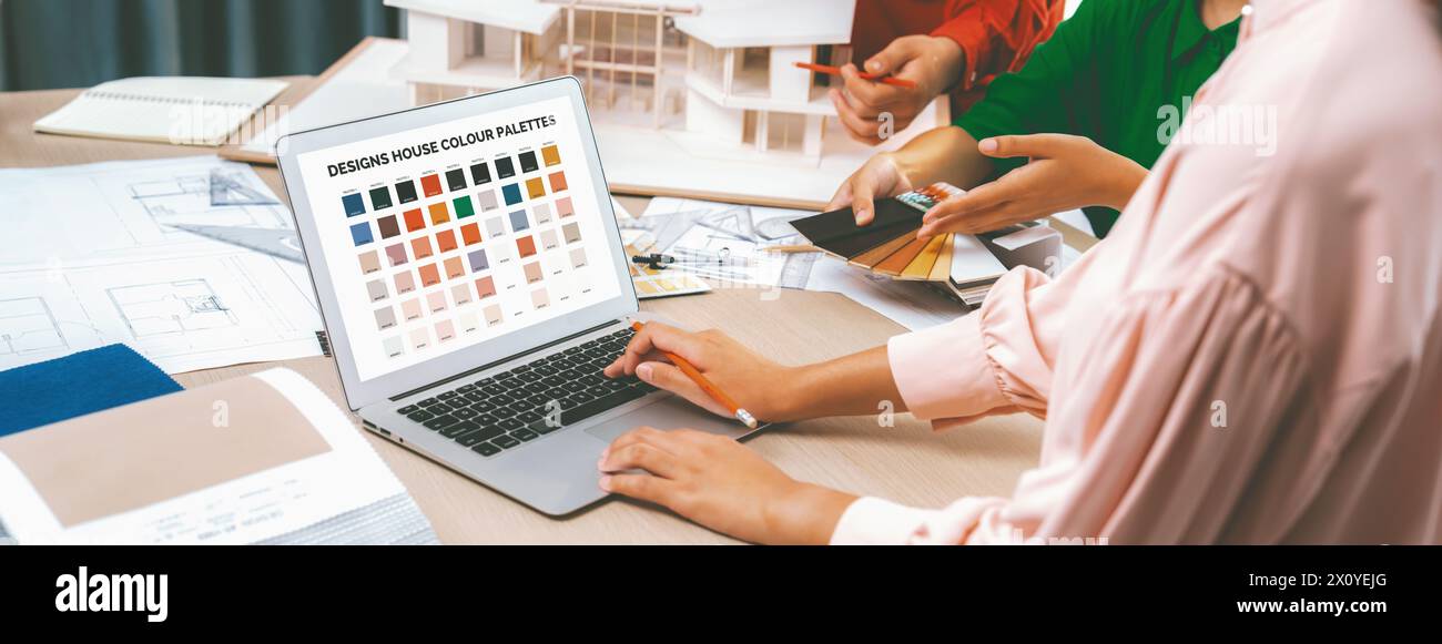 Cropped imaged of professional interior designers choose color material ...
