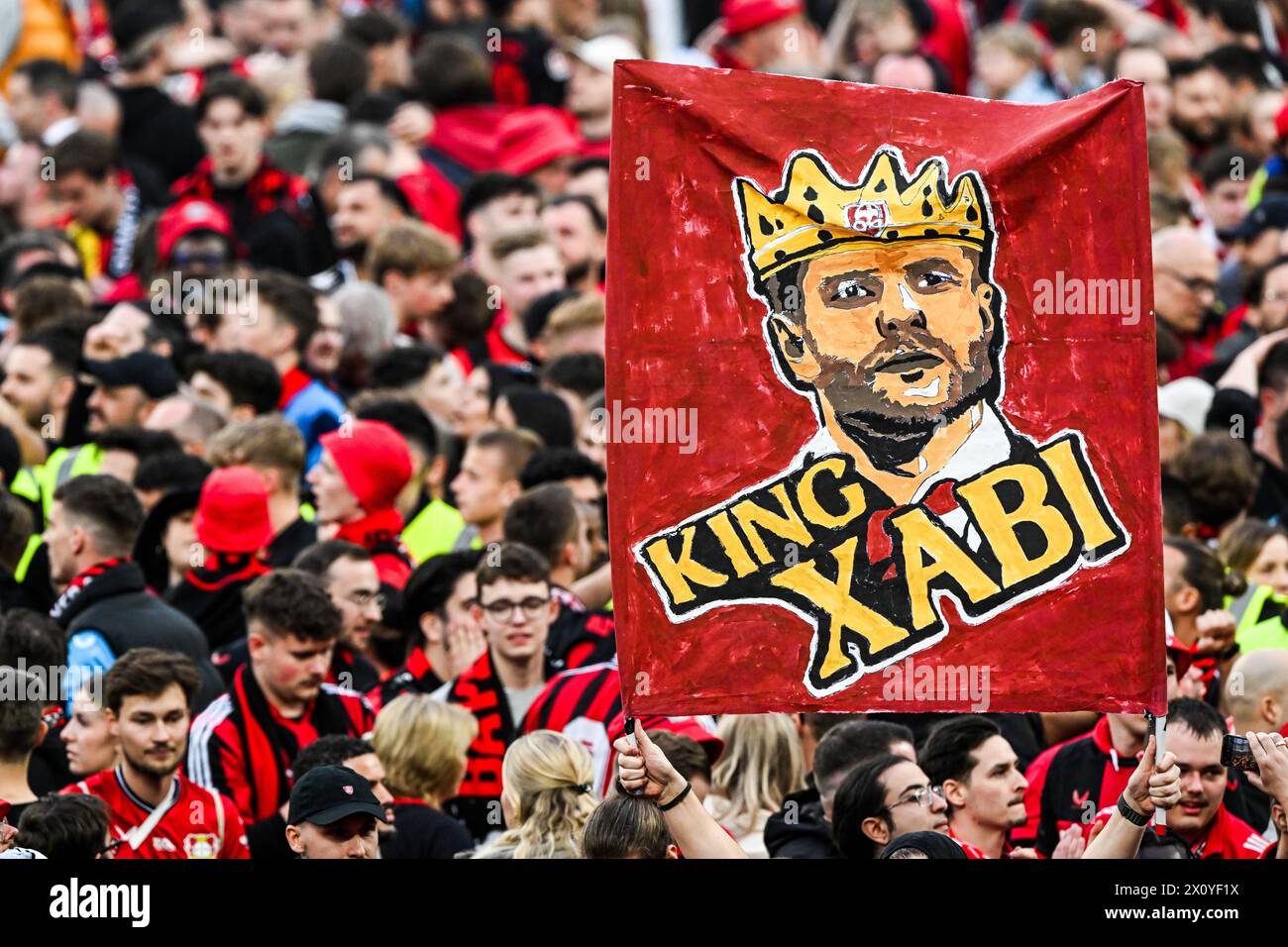 LEVERKUSEN - Bayer Leverkusen fans celebrate the championship during the Bundesliga match between Bayer 04 Leverkusen and Werder Bremen at the Bay Arena on April 14, 2024 in Leverkusen, Germany. ANP | Hollandse Hoogte | GERRIT VAN COLOGNE Stock Photo