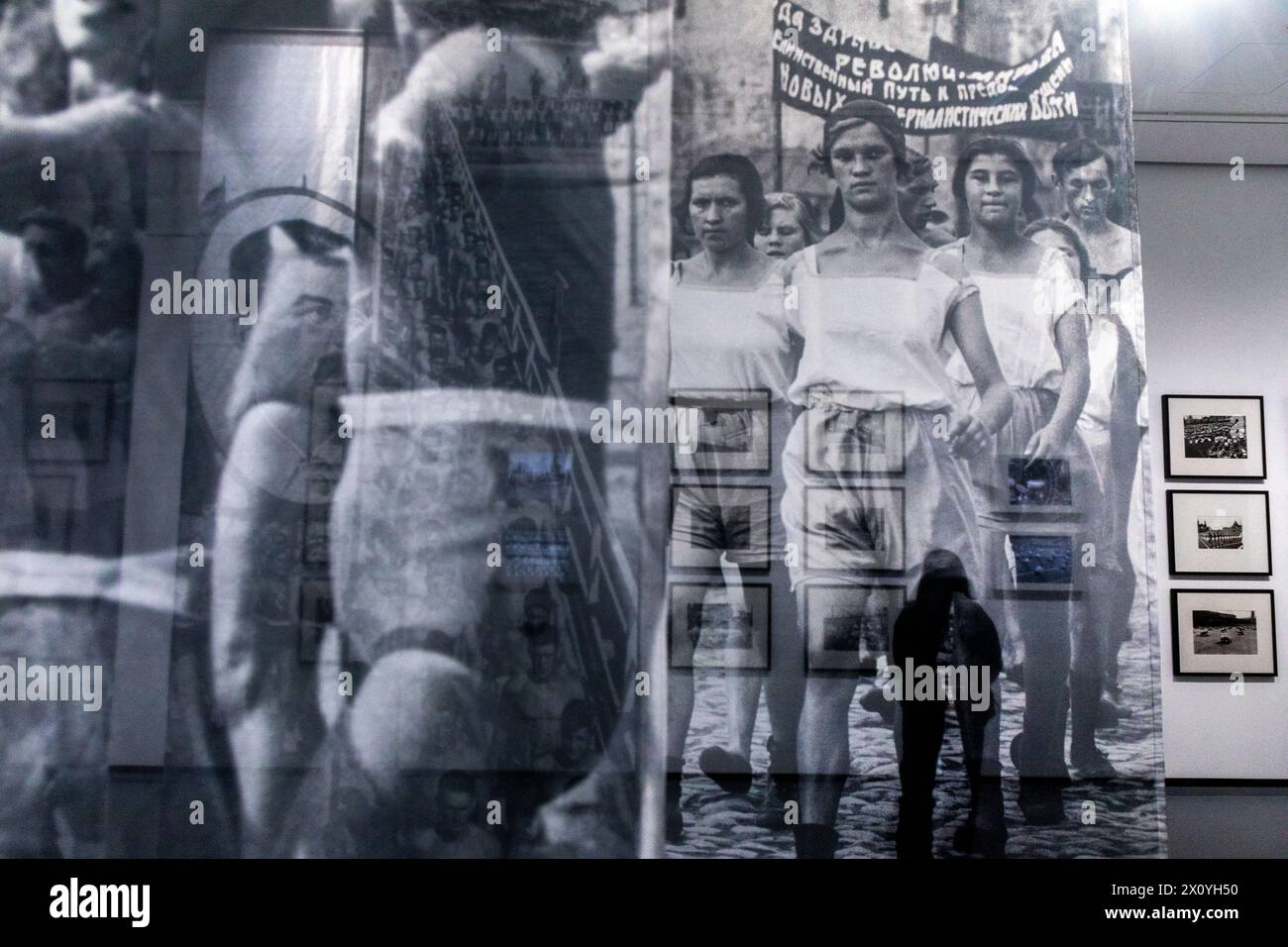 Moscow, Russia. 12th of April, 2024. People watches the exhibition 'Sport in photography from Rodchenko to the present day' at the Multimedia Art Museum which reopening after major renovation, in Moscow, Russia. Credit: Nikolay Vinokurov/Alamy Live News Stock Photo
