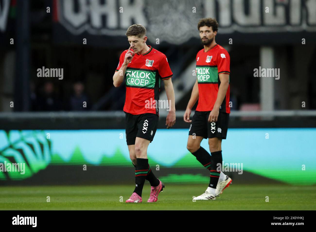 NIJMEGEN - (l-r) Mees Hoedemakers of NEC Nijmegen, Philippe Sandler of NEC Nijmegen during the Dutch Eredivisie match between NEC Nijmegen and PEC Zwolle in De Goffert on April 14, 2024 in Nijmegen, Netherlands. ANP BART STOUTJESDIJK Stock Photo