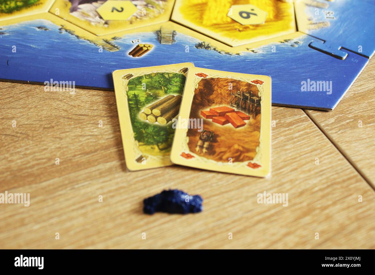 Mozyr, Belarus, April 01 2024 A catan board game buying a road with