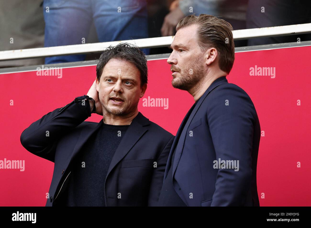 AMSTERDAM - (l-r) Ajax technical manager Kelvin de Lang, Ajax Director of Football Marijn Beuker during the Dutch Eredivisie match between Ajax Amsterdam and FC Twente at the Johan Cruijff ArenA on April 14, 2024 in Amsterdam, Netherlands. ANP | Hollandse Hoogte | MAURICE VAN STEEN Stock Photo