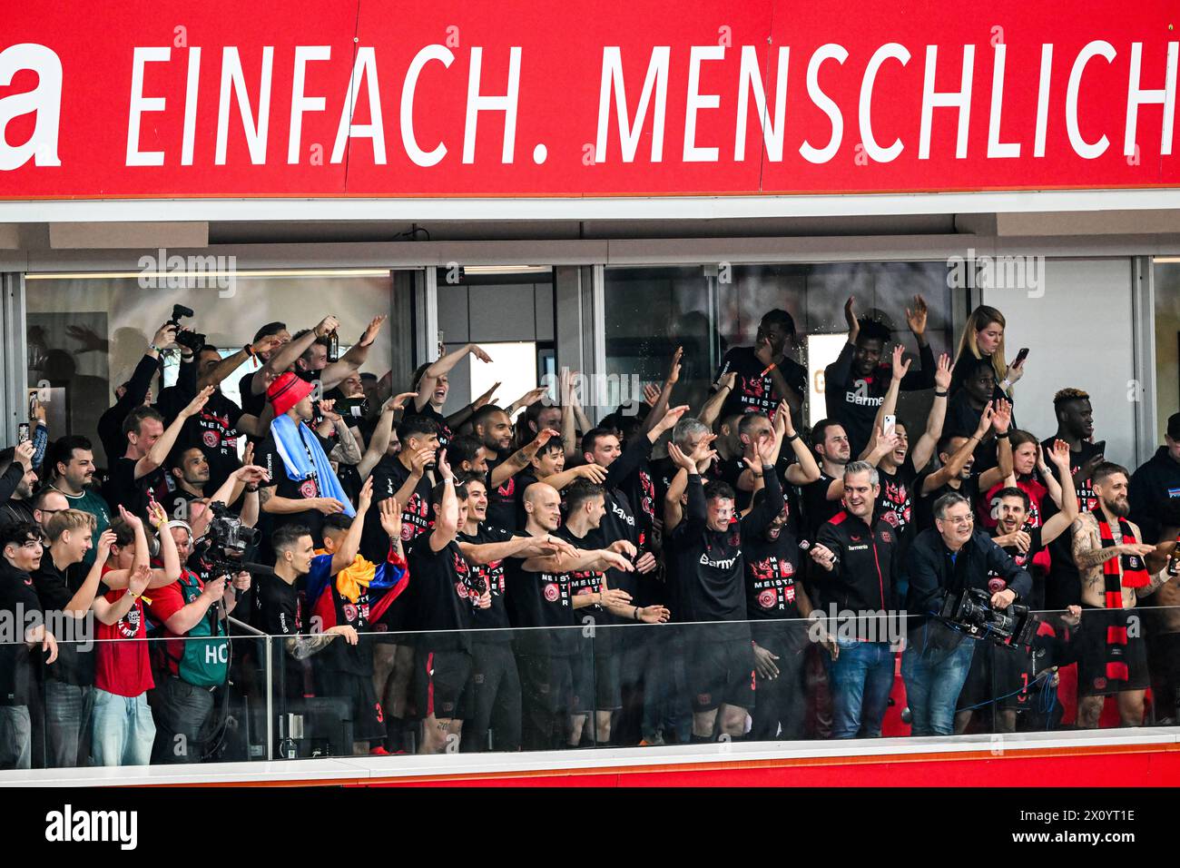 LEVERKUSEN - The players of Bayer Leverkusen celebrate the championship during the Bundesliga match between Bayer 04 Leverkusen and Werder Bremen at the Bay Arena on April 14, 2024 in Leverkusen, Germany. ANP | Hollandse Hoogte | GERRIT VAN COLOGNE Stock Photo