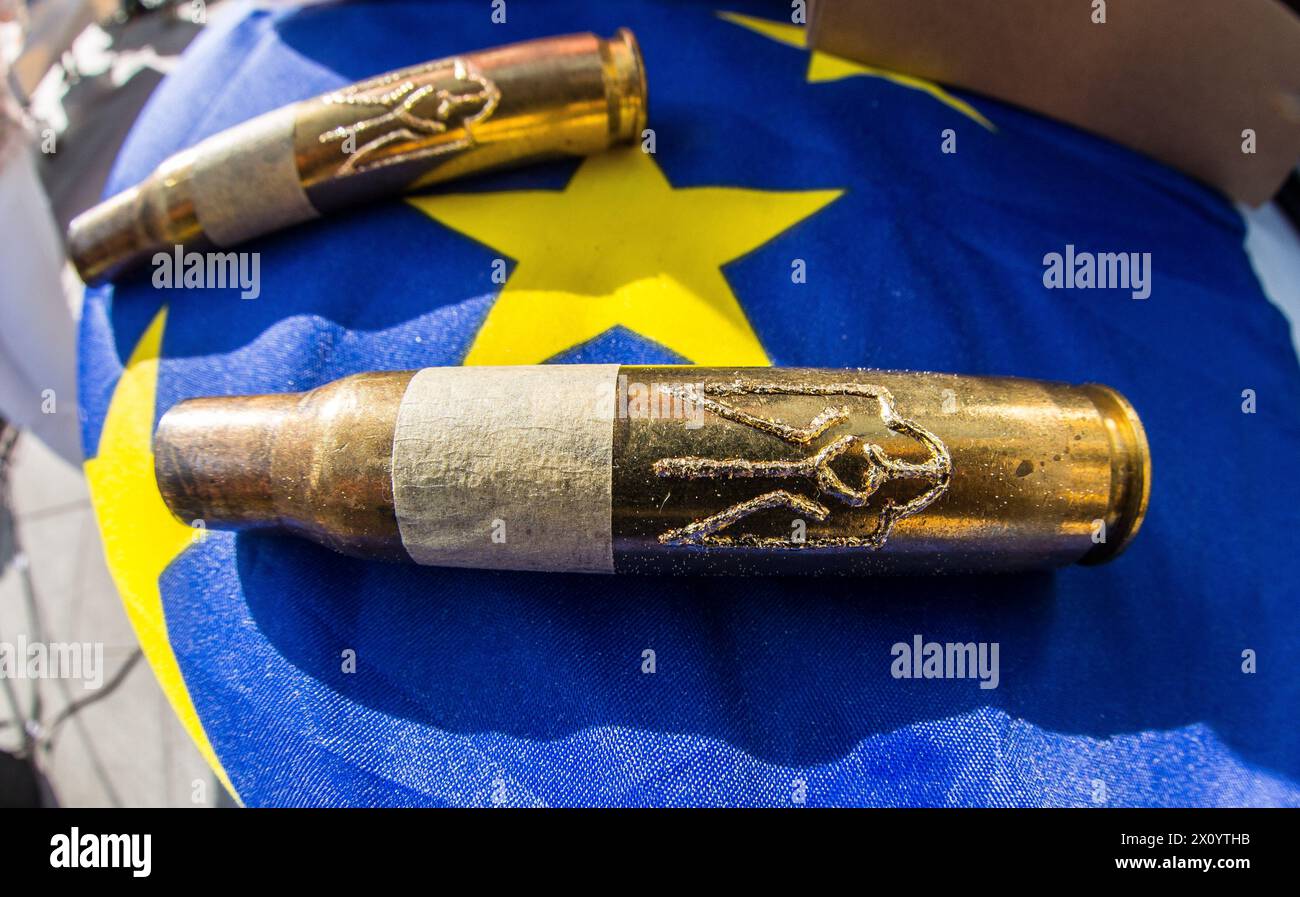 April 14, 2024: Spent cartridges on display over the EU flag in Munich, Germany. Under the motto ''Victory for Peace'', Ukrainians and their supporters in Munich, Germany demonstrated to thank Germany for its support of the Ukrainian state and the refugees while demanding more ammunition from the western alliance to stop the war in Ukraine, defend Europe's territorial integrity, and ultimately save lives. (Credit Image: © Sachelle Babbar/ZUMA Press Wire) EDITORIAL USAGE ONLY! Not for Commercial USAGE! Stock Photo