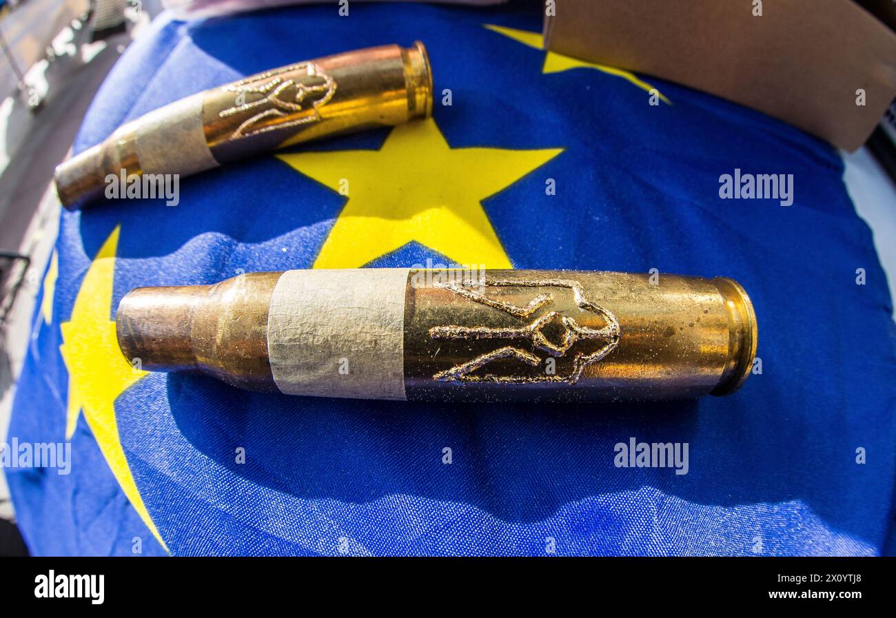 April 14, 2024: Spent cartridges on display over the EU flag in Munich, Germany. Under the motto ''Victory for Peace'', Ukrainians and their supporters in Munich, Germany demonstrated to thank Germany for its support of the Ukrainian state and the refugees while demanding more ammunition from the western alliance to stop the war in Ukraine, defend Europe's territorial integrity, and ultimately save lives. (Credit Image: © Sachelle Babbar/ZUMA Press Wire) EDITORIAL USAGE ONLY! Not for Commercial USAGE! Stock Photo