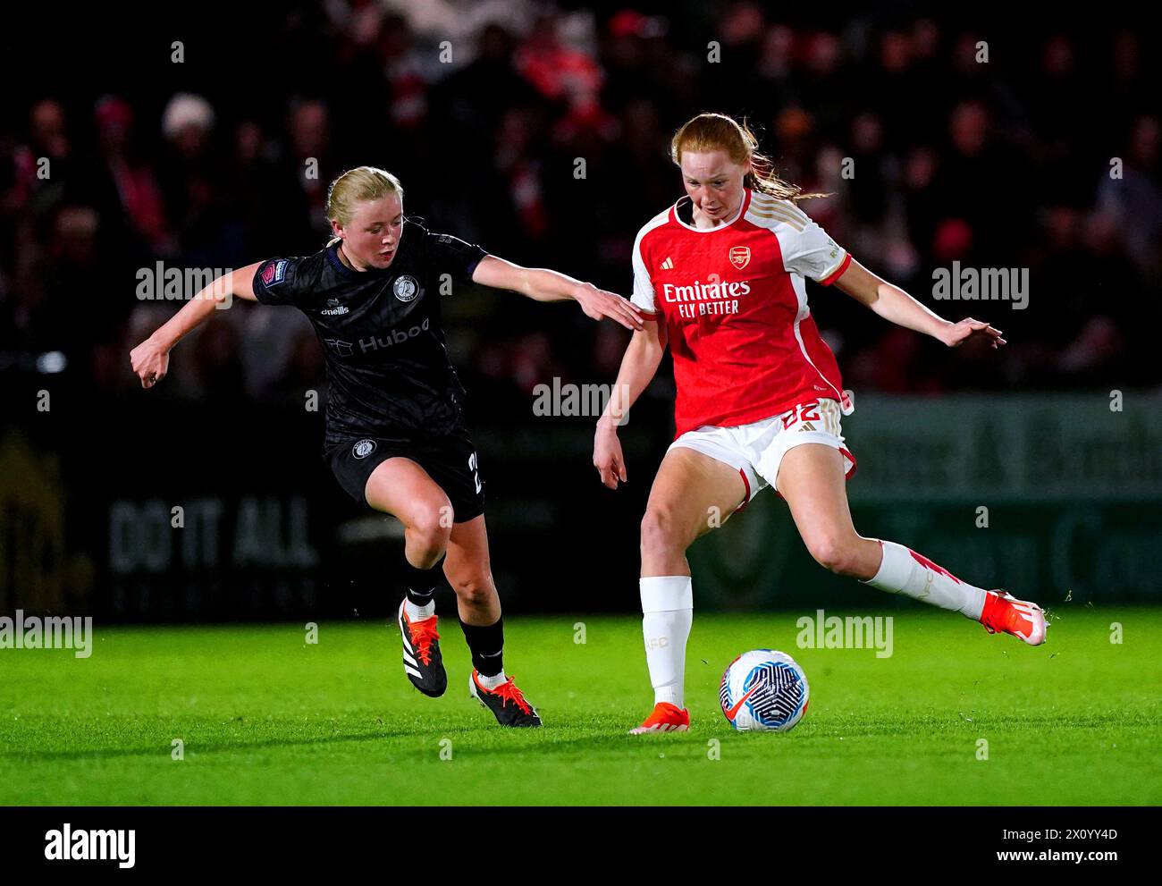 Arsenal's Katie Reid (right) and Bristol City's Mari Ward battle for the ball during the Barclays Women's Super League match at the Mangata Pay UK Stadium, Borehamwood. Picture date: Sunday April 14, 2024. Stock Photo
