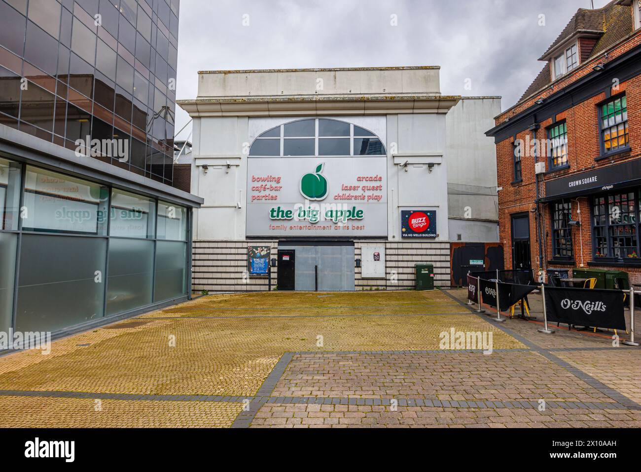 The Big Apple, a closed, boarded up and disused family entertainment centre in central Woking, a town in Surrey, England Stock Photo