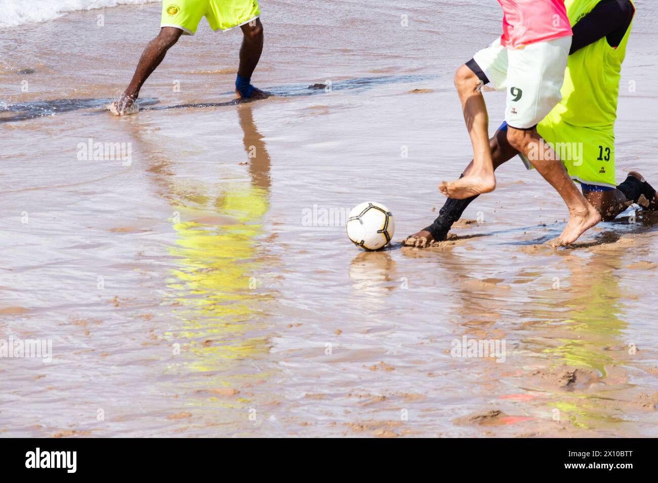 Salvador, Bahia, Brazil - September 15, 2019: Beach soccer players are seen playing on the beach in the city of Salvador, Bahia. Stock Photo