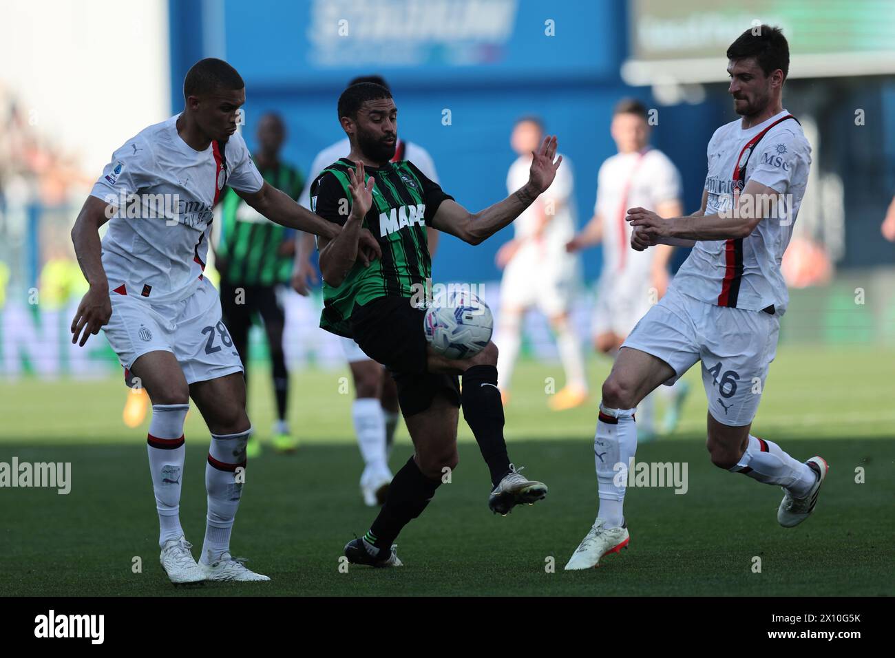 Malick Thiaw (Milan)Gregoire Defrel (Sassuolo)Mattia Gabbia (Milan) during the Italian 'Serie A' match between Sassuolo 3-3 Milan at Mapei Stadium on April 14, 2024 in Reggio Emilia, Italy. Credit: Maurizio Borsari/AFLO/Alamy Live News Stock Photo