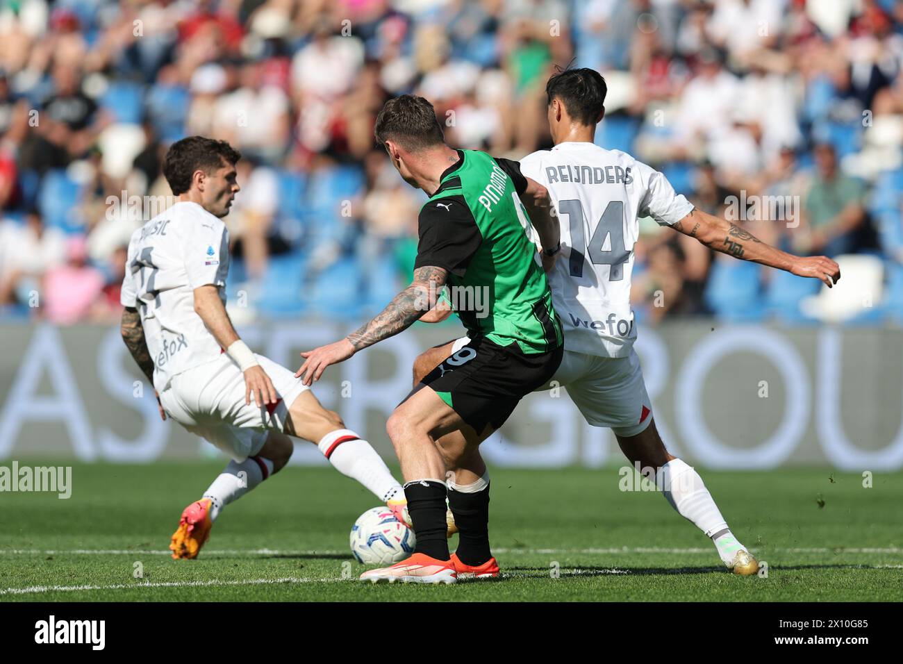 Christian Pulisic (Milan)Andrea Pinamonti (Sassuolo)Tijjani Reijnders (Milan) during the Italian 'Serie A' match between Sassuolo 3-3 Milan at Mapei Stadium on April 14, 2024 in Reggio Emilia, Italy. Credit: Maurizio Borsari/AFLO/Alamy Live News Stock Photo