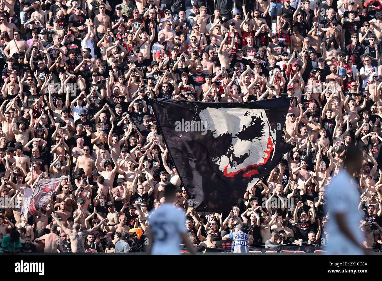 Supporters (Milan) during the Italian 'Serie A' match between Sassuolo 3-3 Milan at Mapei Stadium on April 14, 2024 in Reggio Emilia, Italy. Credit: Maurizio Borsari/AFLO/Alamy Live News Stock Photo