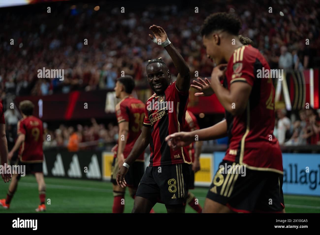 Atlanta, Georgia, USA. 14th Apr, 2024. Tristan Muyumba Nkita giving a high-five to Caleb Wiley (Credit Image: © Andrew Clark/ZUMA Press Wire) EDITORIAL USAGE ONLY! Not for Commercial USAGE! Stock Photo